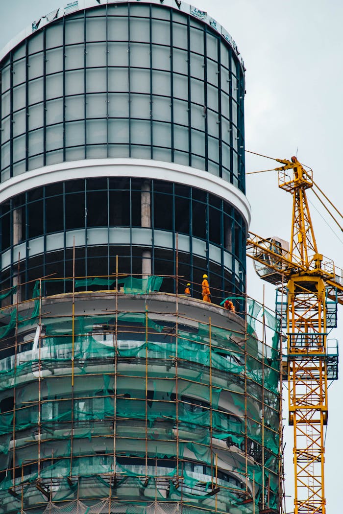 services-03 Skyscraper construction with crane in Nairobi, highlighting modern architecture and urban development.